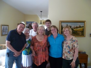 A rare photo with all three sisters together, our father and his partner and my husband and my sister's son.