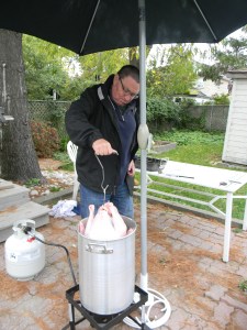 Deep frying the turkey.