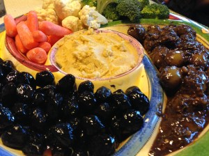 The green olives were the best I've ever eaten. They were purchased at the Iranian market. The marinade included ground walnuts and it became a great dipping sauce as well.