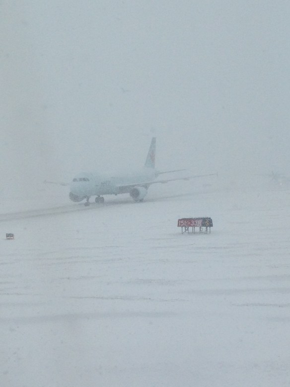 Sitting on the tarmac waiting to be de-iced