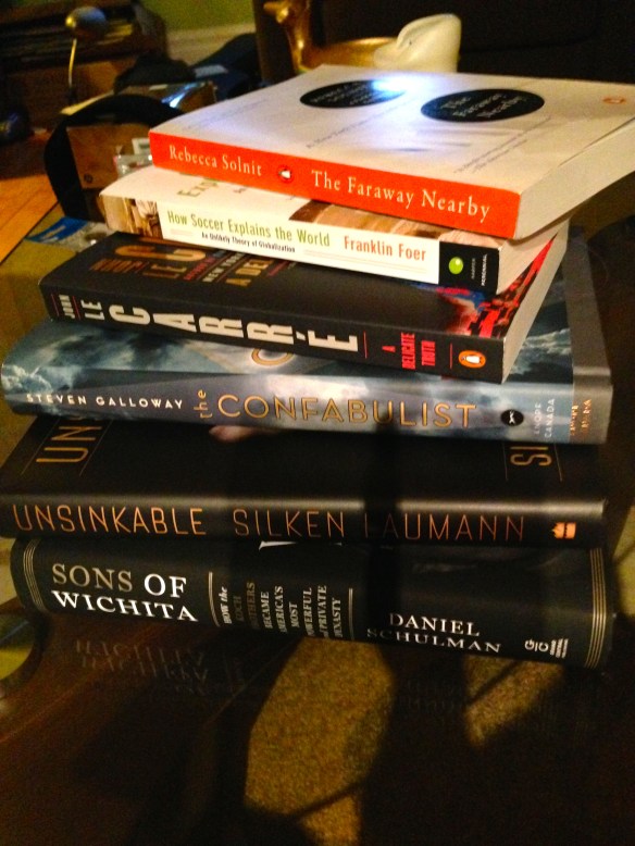 Reading the collection of books that I bid on at the silent auction.