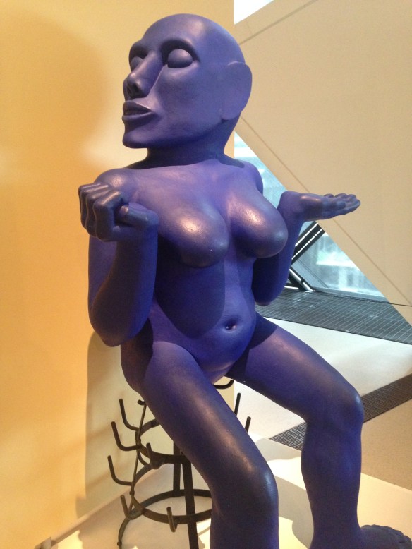 A south Asian sculpture using teak and indigo to represent the region.